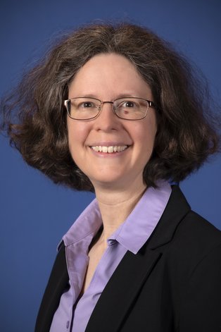 Porträtfoto Michelle Dossett